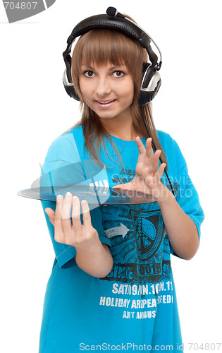 Image of Girl in earphone with vinyl disk
