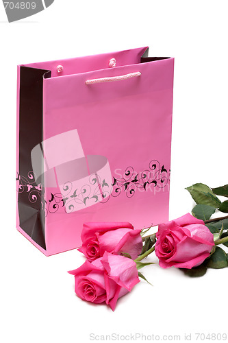 Image of Rose gift package and three roses