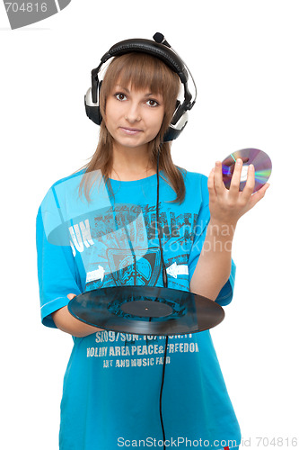 Image of Girl with vinyl disk and DVD