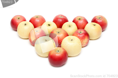 Image of Red and yellow apple put by triangle
