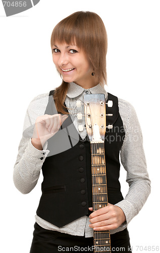 Image of Young girl with guitar in hand