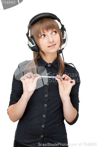 Image of Beautiful girl in earphone and pencil