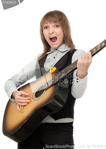 Image of Girl with guitar in hand expressive sings