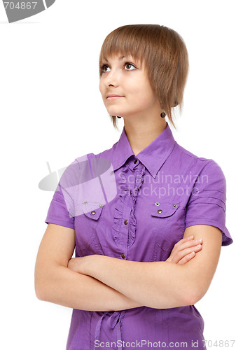 Image of Young girl in violet blouse smiles