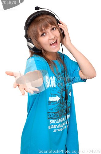 Image of Young girl in earphone sings