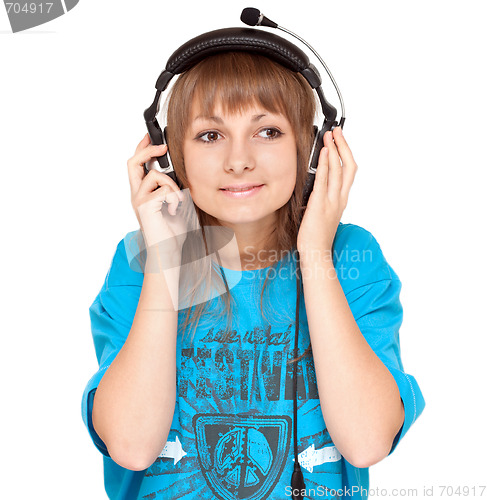 Image of Girl in earphone smiles, portrait