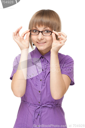 Image of Young girl in violet blouse and spectacles