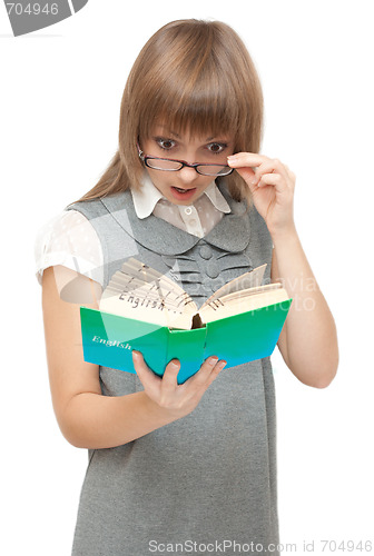 Image of Young girl reads english and wonders
