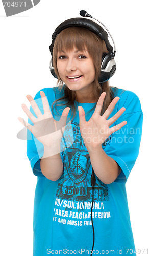 Image of Girl in earphone shows palm