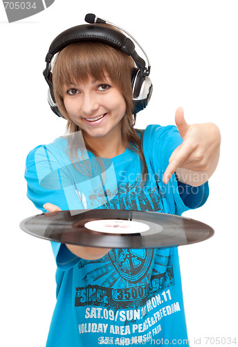 Image of Girl in earphone with vinyl disk in hand