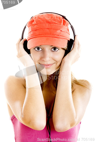 Image of Young woman listen music