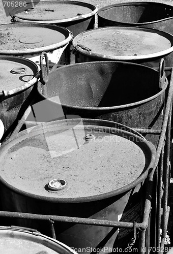 Image of Old rusty waste barrels