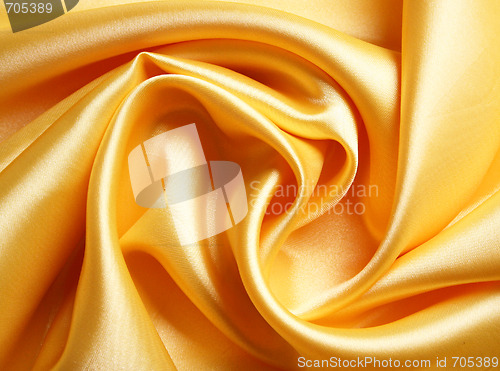 Image of Smooth elegant golden satin as background 