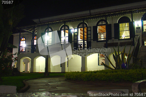 Image of Old farm house at night