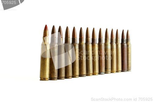 Image of Row of M16 cartridges converging in perspective 