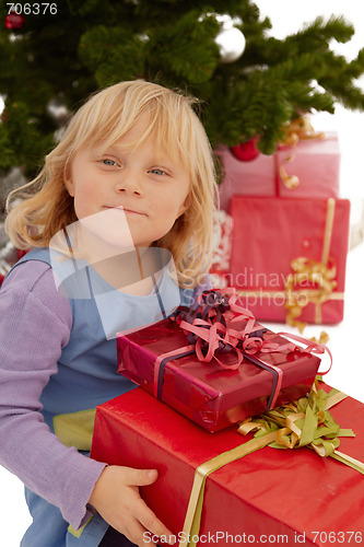 Image of Christmas - Little girl with lots of presents