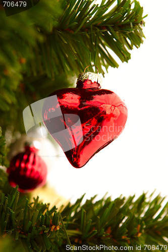 Image of Christmas - Red heart decoration on white