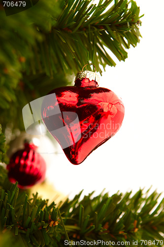 Image of Christmas - Red heart decoration on white