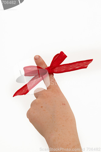 Image of Pointing a ribbon on a finger