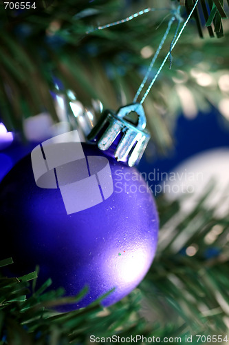 Image of Christmas ornaments on tree.