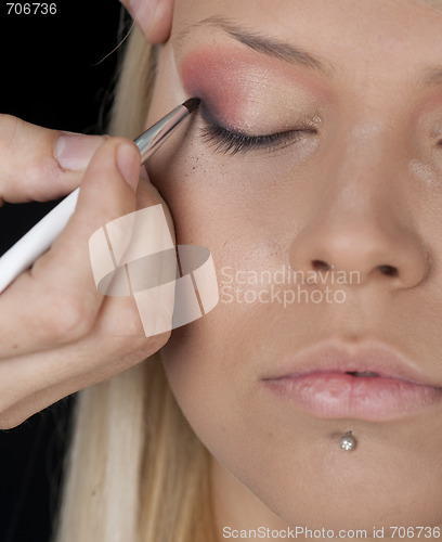 Image of Applying professional make up