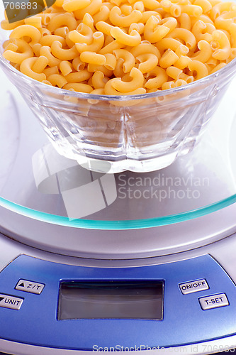 Image of Macaroni Noodles Being Weighed