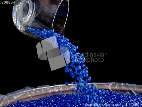 Image of Pouring Plastic Colored Beads