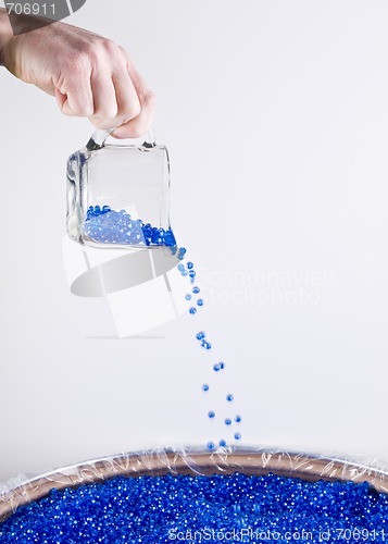 Image of Pouring Plastic Colored Beads