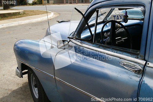 Image of Blue vintage taxi cab in Havana, Cuba