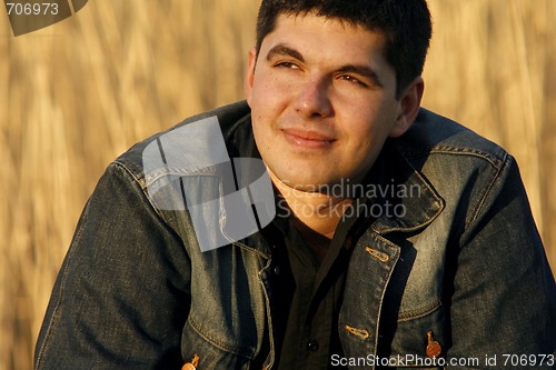 Image of Young handsome man smiling