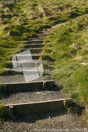 Image of Steps leading up the grassy hill