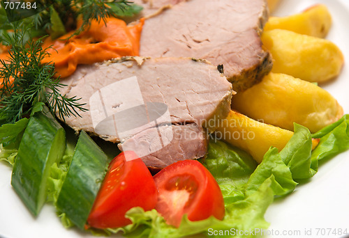 Image of meat dish with fresh vegetables