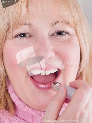 Image of Mature Woman in Pink