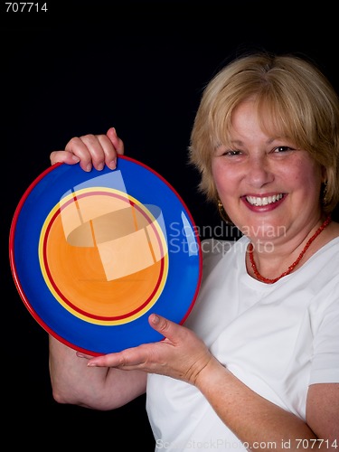 Image of Mature Woman with colorful plate