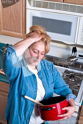 Image of Mature Woman in Kitchen