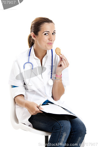 Image of Nurse eating a cookie