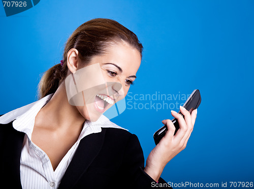 Image of Businesswoman calling at phone