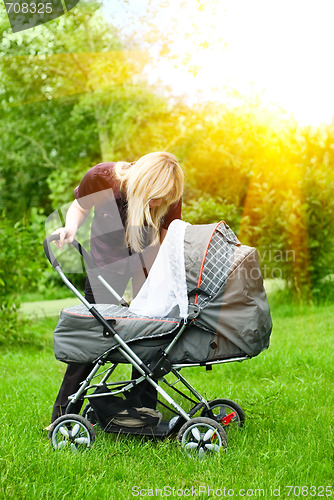 Image of mother with baby carriage