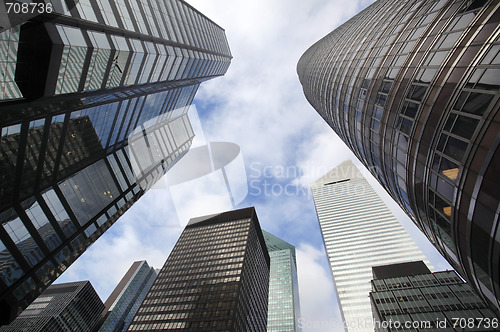 Image of New York City buildings, looking up