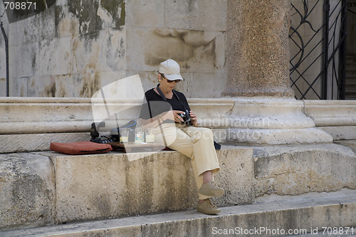 Image of Female tourist split