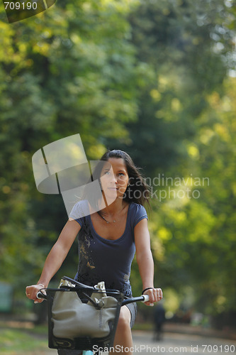 Image of Woman riding a bicycle