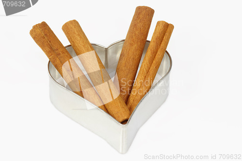 Image of Cinnamon and cookie cutter