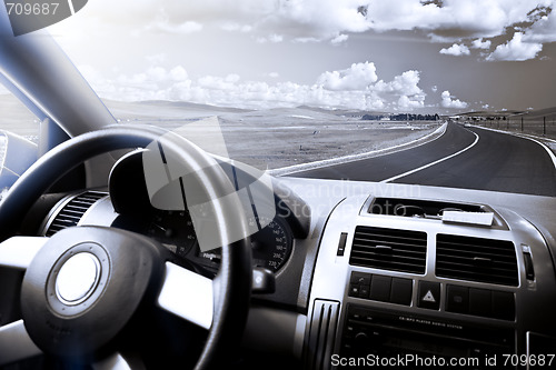 Image of car and meadow