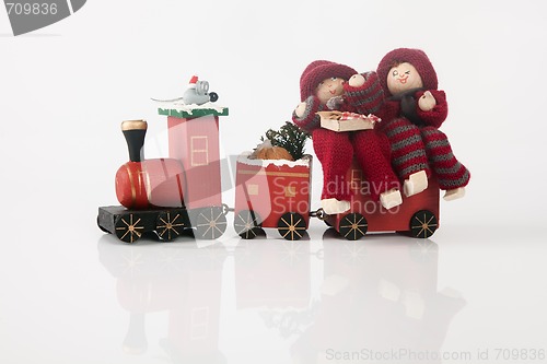 Image of Elfs on a toy train