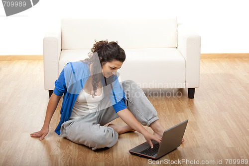 Image of Girl using a laptop