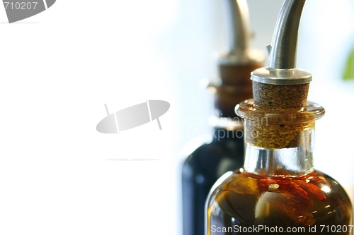 Image of Bottle of extra virgin olive oil and balsamic vinegar