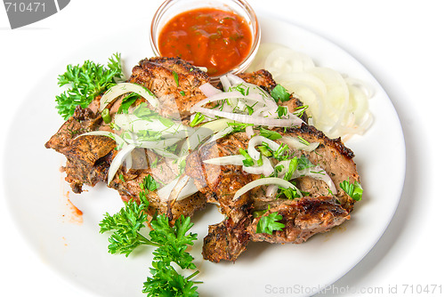 Image of Grilled meat with sauce