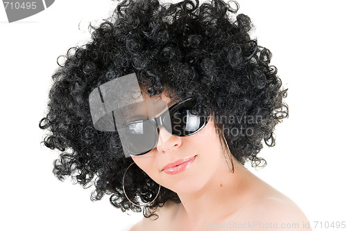 Image of frizzy woman with sunglasses