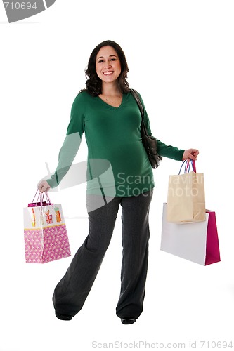 Image of Happy woman with shopping bags