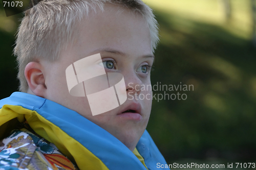 Image of Down Syndrome Boy Wearing Life Jacket